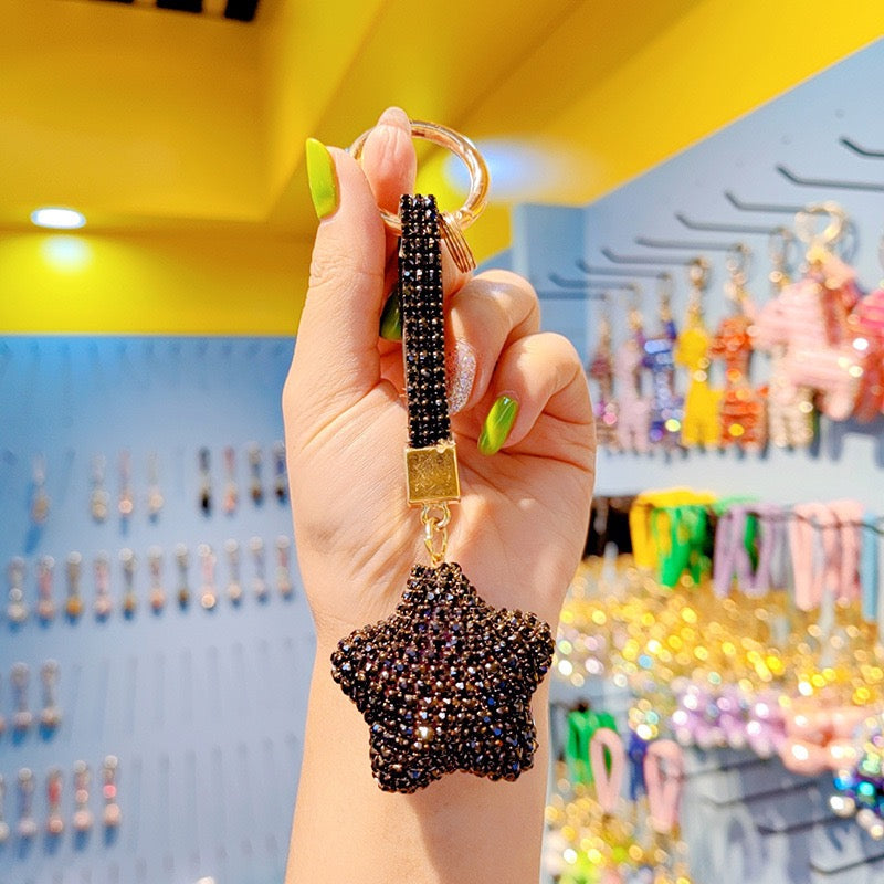 A keychain full of diamond five-pointed stars