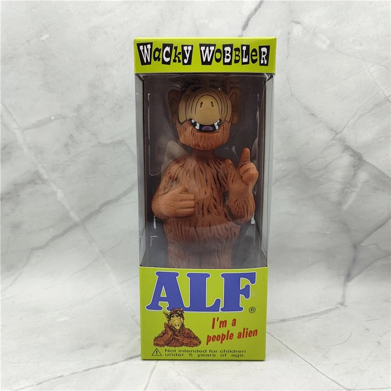 Shaking Head Figurine